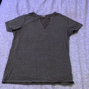 a gray short sleeve shirt.